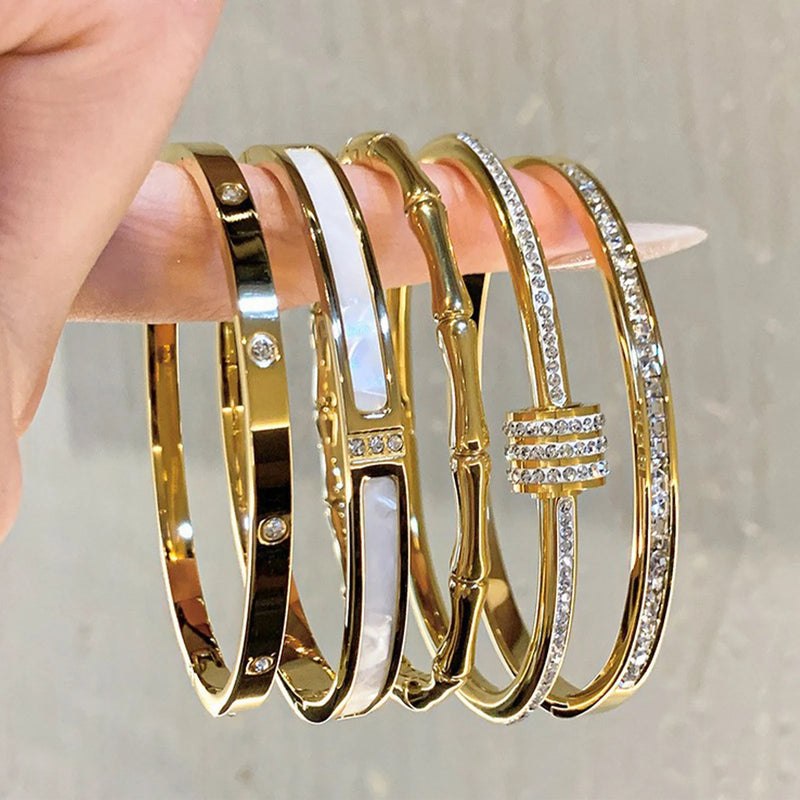 Pulseira de aço titânico e ouro